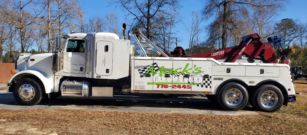 Mack's Towing white Century heavy duty wrecker